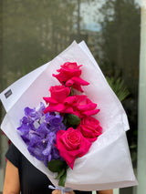 Bouquet de Roses Fucsia i Orquídies